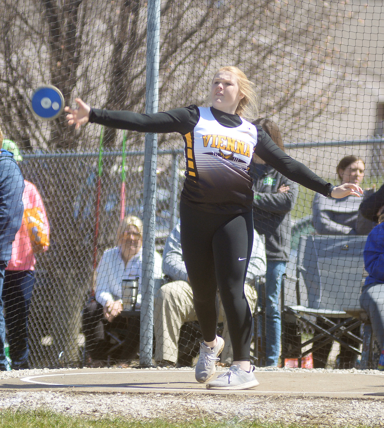 Ava Kloeppel lets one of her four attempts fly in the girls discus during Friday’s rescheduled track meet at Linn High School.